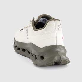 On Running trainer in Fern Grain, rear three-quarter view showing olive green CloudTec sole and cream mesh upper with logo detail.