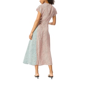 Model wearing Whistles pink polka dot midi dress with colour-block mint green panel, short sleeves, shown from behind with black heels