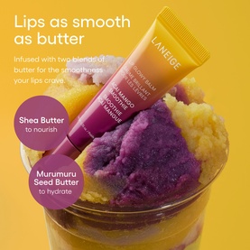Laneige Lip Glowy Balm Mango Acai Smoothie tube resting on mango and acai ice cream scoops, highlighting shea butter and murumuru seed butter
