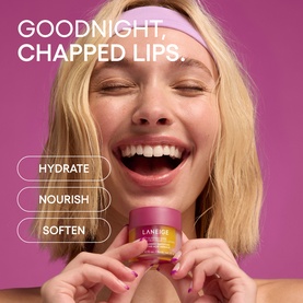 Model with Laneige Lip Sleeping Mask Acai Mango Smoothie, holding pink jar, smiling, wearing pink headband. Text reads Goodnight, Chapped Lips.