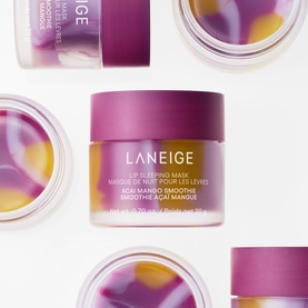 Laneige Lip Sleeping Mask Acai Mango Smoothie in purple-lidded jar, shown alongside multiple open jars from above.