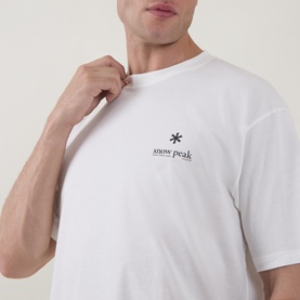 Model wearing Snow Peak off white crew neck T-shirt with small logo graphic print to chest