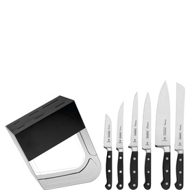 Tramontina black knife block set with five stainless steel kitchen knives featuring black handles, displayed fanned out beside the block