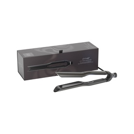 GHD hair straightener in matte black with dark grey box packaging, featuring wide ceramic plates and sleek design
