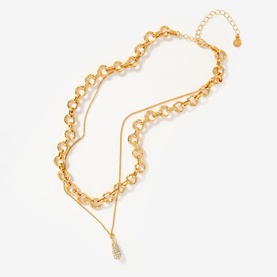 Mint Velvet gold layered necklace set with chunky chain link and delicate chain with crystal drop pendant
