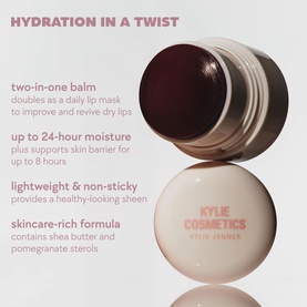 Kylie Cosmetics two-in-one lip balm and mask jar, open lid showing deep berry-toned product, with hydration benefit callouts.