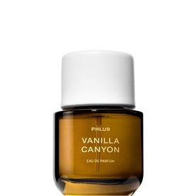 Phlur Vanilla Canyon Eau de Parfum in an amber glass bottle with white cap and gold label