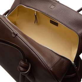 Jacquemus dark brown pebbled calfskin bag, open top view showing gold-tone zip and beige interior lining