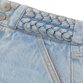 Levi's children's light blue denim jeans close-up showing braided waistband detail with silver button fastening and contrast stitching