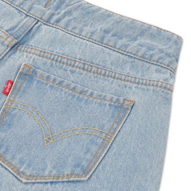 Levi's children's jeans in light blue denim, close-up of back pocket with signature red tab and gold stitching detail