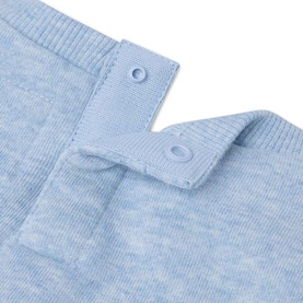 Levi's baby set in Skyway Heather blue, close-up of ribbed knit fabric with snap button shoulder fastening detail.