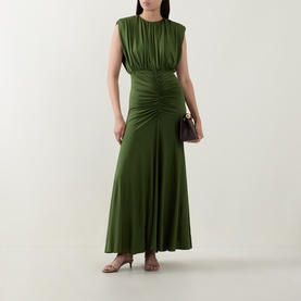 Model wearing Self-Portrait olive maxi dress with ruched waist detail and sleeveless silhouette, styled with strappy heels and a small clutch bag.
