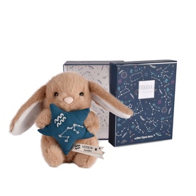 Histoire d'Ours small beige bunny plush with teal star bib, shown with navy constellation-print gift box