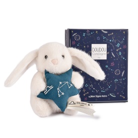 Histoire d'Ours white plush bunny holding teal star cushion with Libra motif, shown with star-print gift box