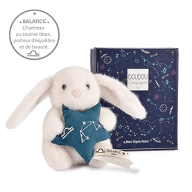 Histoire d'Ours white plush bunny holding teal star, shown with navy Doudou Zodiaque Balance star sign gift box