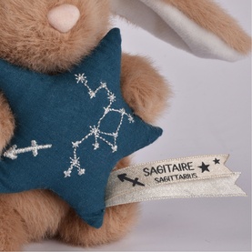 Histoire d'Ours Sagittarius plush bunny, brown fur with teal star cushion featuring embroidered constellation and woven label