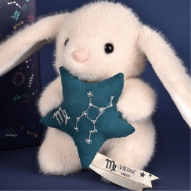 Histoire d'Ours white plush bunny holding teal star with embroidered Virgo constellation, with zodiac gift box behind