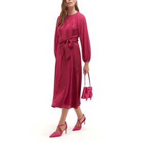 Model wearing Hobbs topaz pink long-sleeve midi dress with tie waist, styled with matching pink heels and mini bag