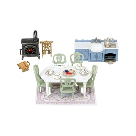 Sylvanian Families dining room playset with green chairs, white table, blue dresser, wood-burning stove, crockery accessories and floral rug