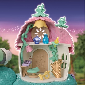 Sylvanian Families fairy treehouse playset interior showing miniature furniture, blue potion bottles, golden harp, and floral roof details in pastel