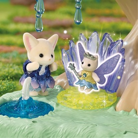 Sylvanian Families fairy garden playset with white fox figure in blue outfit and winged fairy figure on crystal stand, multi-coloured