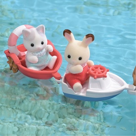 Sylvanian Families cat and rabbit figures in small red and blue boats on water, multicoloured toy set