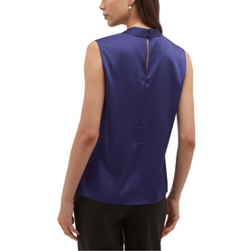 Model wearing Hobbs violet blue sleeveless satin top, back view showing keyhole neckline and button detail, styled with black trousers.