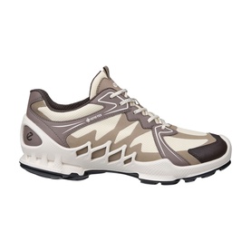 ECCO trainer in cream and taupe with geometric panelling, dark rubber sole, and Gore-Tex branding on tongue