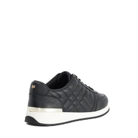 Dune black quilted leather trainer with gold heel tab and thick white sole, rear angle view