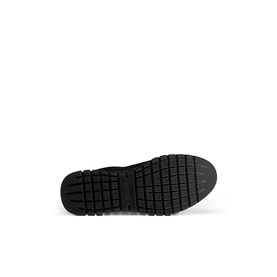 Black chunky rubber outsole with deep treaded lug pattern, shown from below on a white background.
