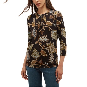 Model wearing Hobbs navy khaki floral print three-quarter sleeve top with crew neck, styled with light blue jeans
