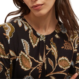 Model wearing Hobbs navy khaki floral embroidered blouse with botanical print, long sleeves and round neckline