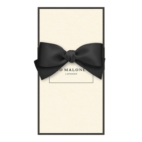 Jo Malone London hand cream in cream gift box tied with large black satin bow ribbon