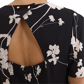 Phase Eight black ivory floral print dress, close-up of open V cut-out back detail with short sleeves