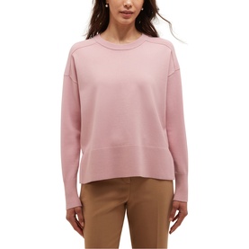 Model wearing Hobbs sweet pink crew neck sweatshirt with dropped shoulders, styled with tan trousers