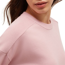 Model wearing Hobbs sweet pink sweatshirt with ribbed crew neck and raglan-style sleeves, close-up detail shot
