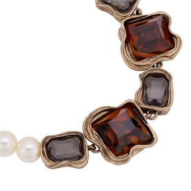 Max Mara Weekend gold-tone necklace with amber and smoky square resin stones set in ornate mounts, alternating with faux pearl links