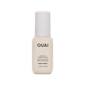 Ouai Leave-In Conditioner in North Bondi, small cream-coloured bottle with white cap, 1.5 fl oz
