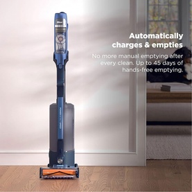 Shark PowerDetect Speed Clean and Empty Pet Pro Cordless Vacuum in blue, upright cordless design with charging dock base and orange brush head.
