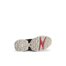 Ecco women's shoe sole in black with textured grey tread and red lightning bolt detail.