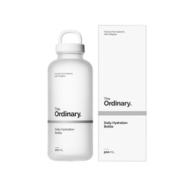 The Ordinary Daily Hydration Bottle, clear frosted finish with branded white cap, shown alongside matching white product box