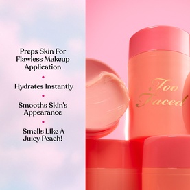 Too Faced Primed & Peachy Primer in peach-toned packaging stacked on pink surface with product texture swatch visible