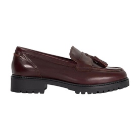Burgundy leather loafer with tassel detail and chunky black lug sole, side profile view