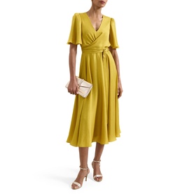 Model wearing Phase Eight yellow wrap midi dress with flutter sleeves and tie waist, styled with nude heels and clutch bag