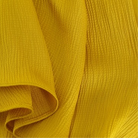Phase Eight yellow crinkle-texture fabric close-up detail shot