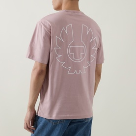 Model wearing Belstaff Border Logo Back Graphic T-Shirt in Dusk Pink, showing large outlined sun logo graphic on back, paired with blue jeans.
