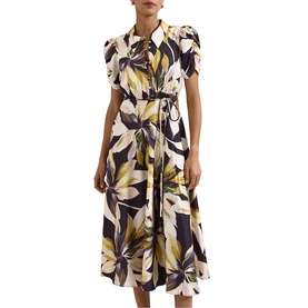 Model wearing Phase Eight black multi floral print midi dress with lace-up neckline, puff sleeves, and self-tie waist belt.
