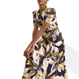 Model wearing Phase Eight black multi floral print midi dress with short sleeves, drawstring waist, and full skirt