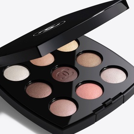 CHANEL eyeshadow palette in open black compact, featuring eight shades in soft pinks, champagne, taupe and brown tones
