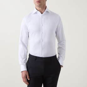 Model wearing Gherardi white single cuff regular shirt with spread collar, styled with black trousers.